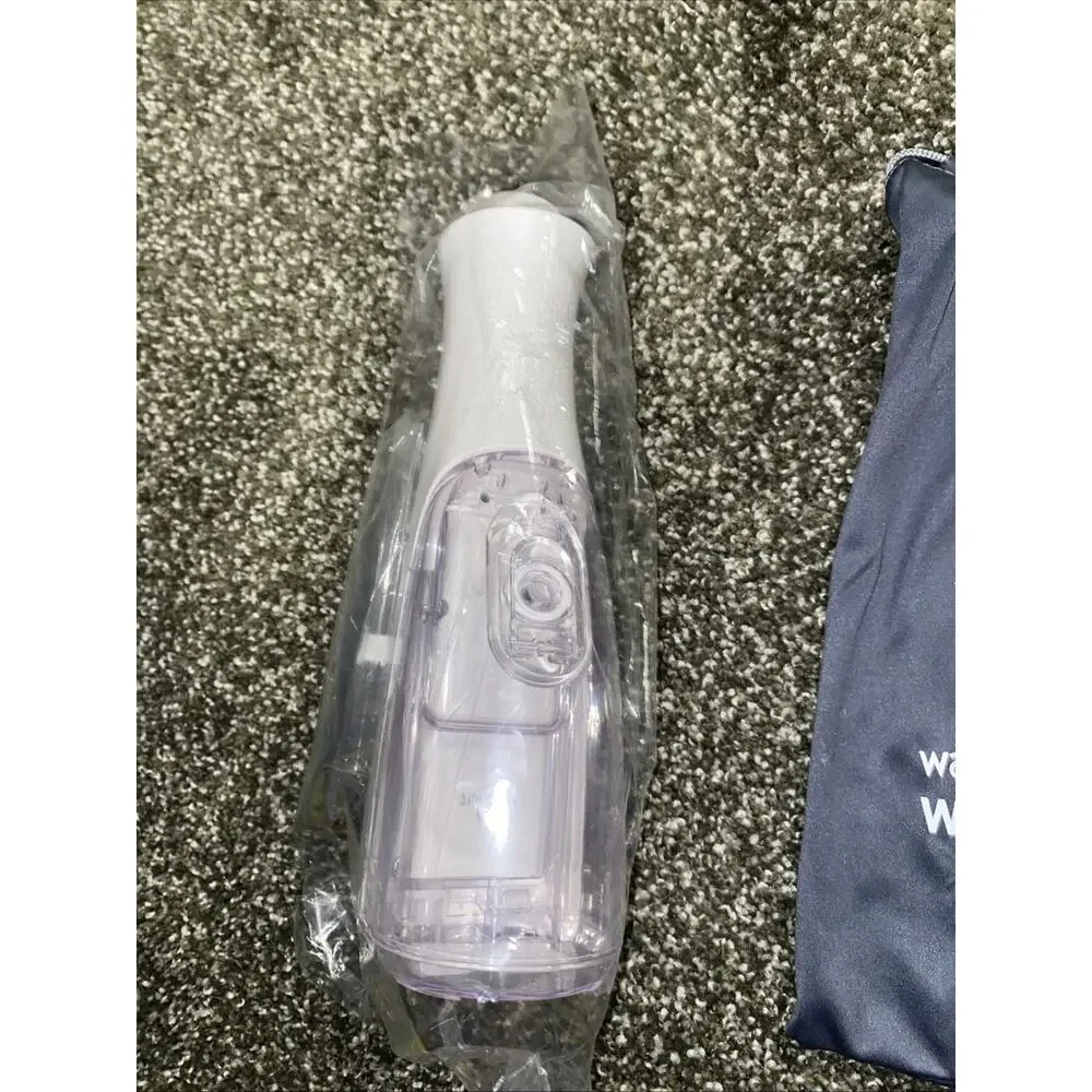 Waterpik Water Flosser WF-10 White with Tips and Charger New In Bag